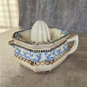 Vintage Ceramic Juicer with Blue Accents